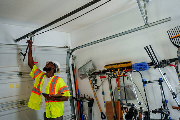 Professional Garage Door Panel Replacement technician working in Fairview Park, IN